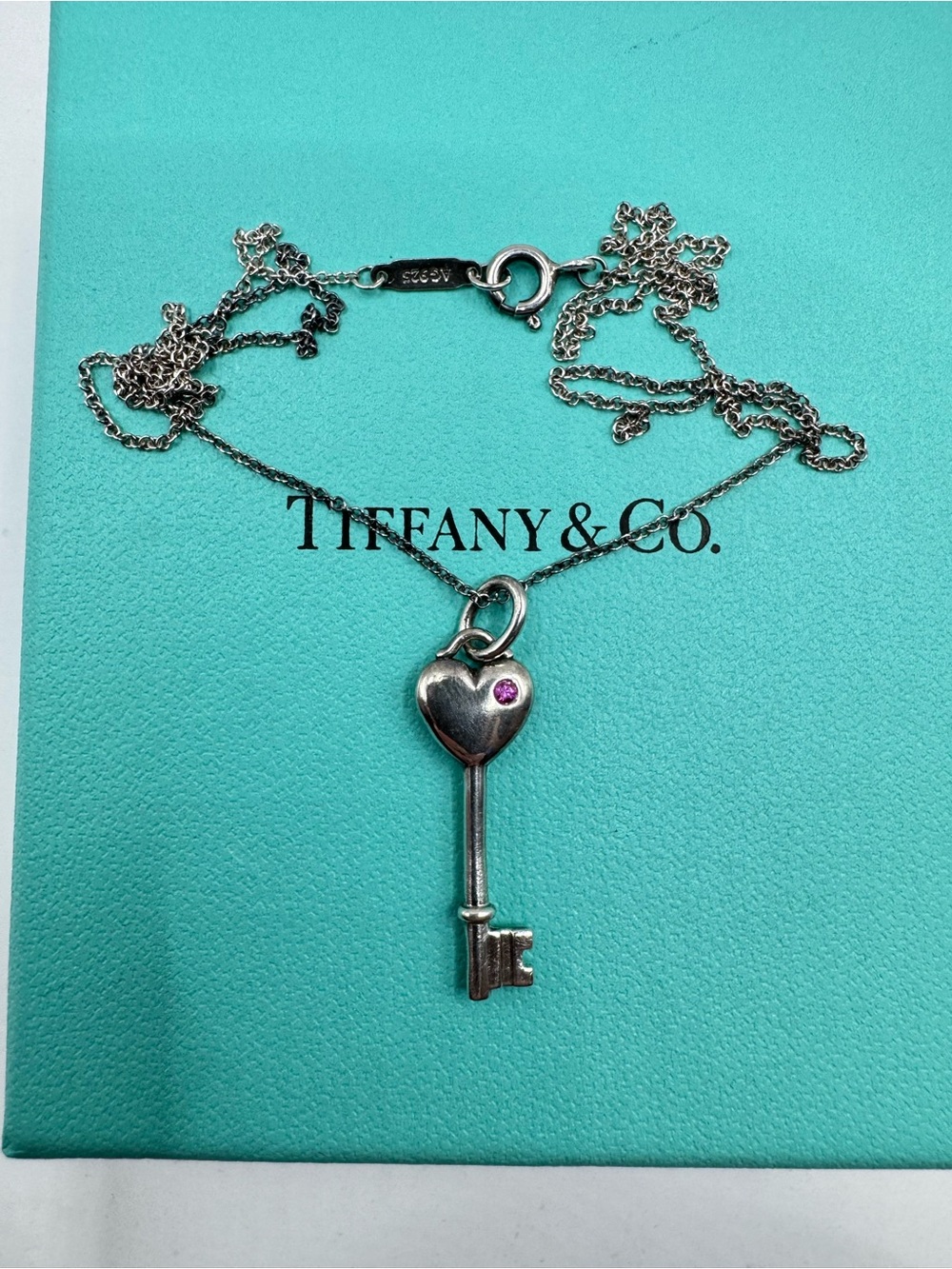 Tiffany & Co. Silver Heart Key Necklace with Pink Sapphire